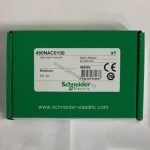 Figure 1: Front view of the Schneider 490NAC0100 industrial automation component showing its physical design and enclosure.